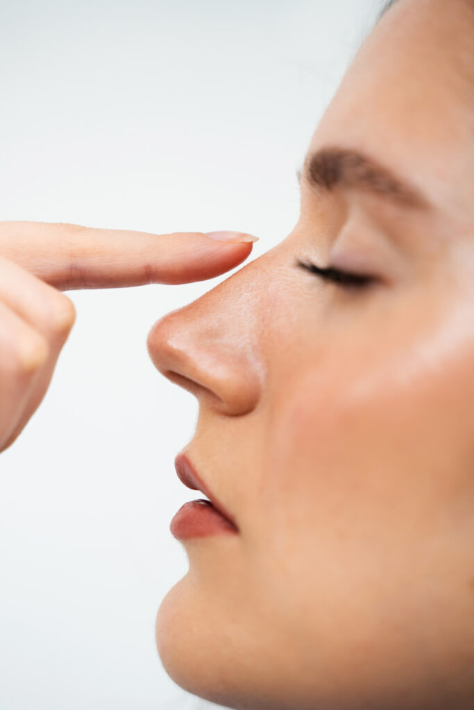 Rhinoplasty-patient-nose-touches